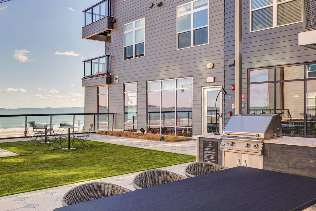 BBQ grilling area with seating area - BLVD at Revere Beach