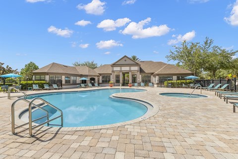 Resort-style swimming pool with heated spa - Delano at Cypress Creek