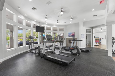 Fitness center with cardio equipment - Egret's Landing Apartments