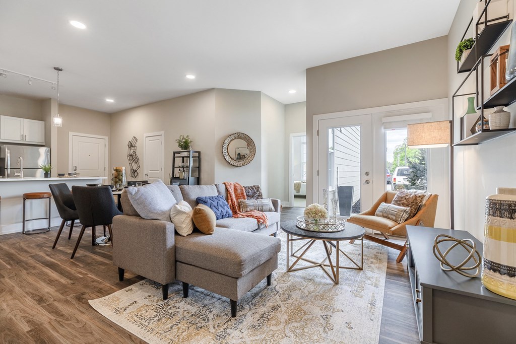 The Airdrie at Paoli Station spacious living room with balcony entrance