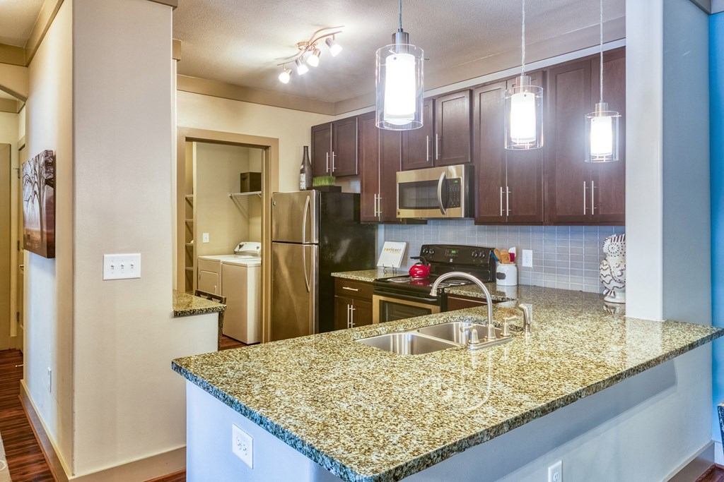 The Oaks at Johns Creek - 42-inch cherry cabinetry