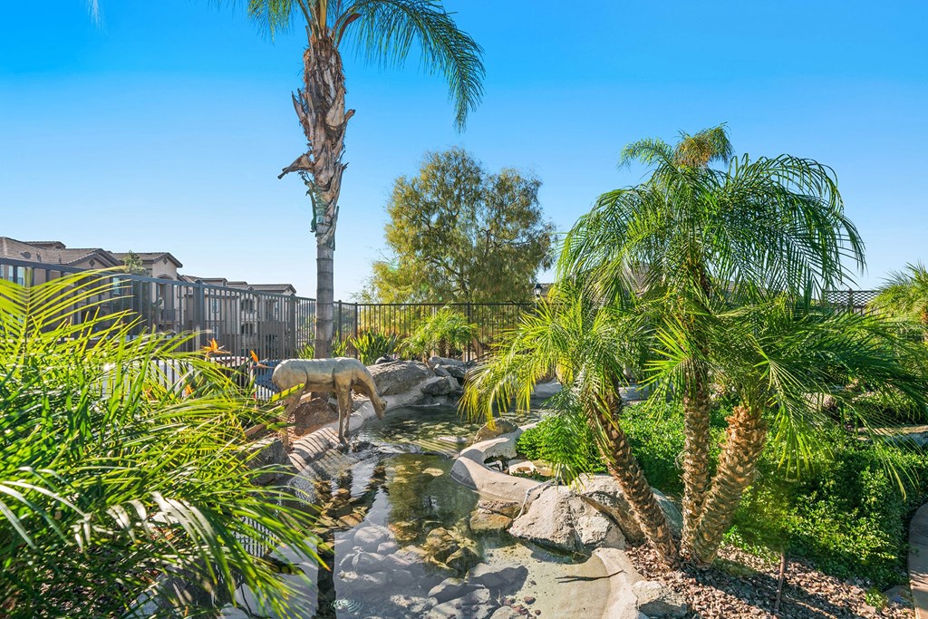 Antelope Ridge Apartments exterior view with palm trees