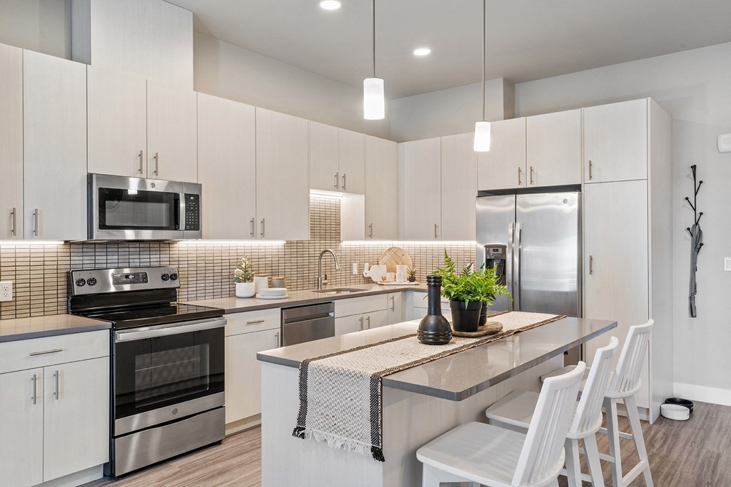 Arazo apartment interior with wood-style flooring and high ceilings