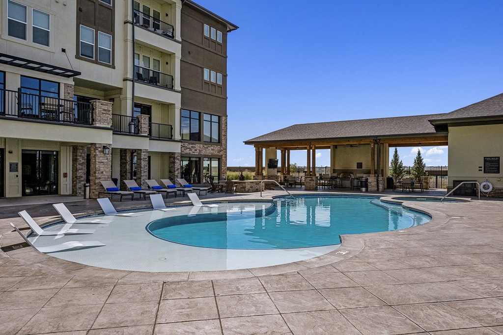Resort-style heated pool and spa with Baja deck - Rise at 2534
