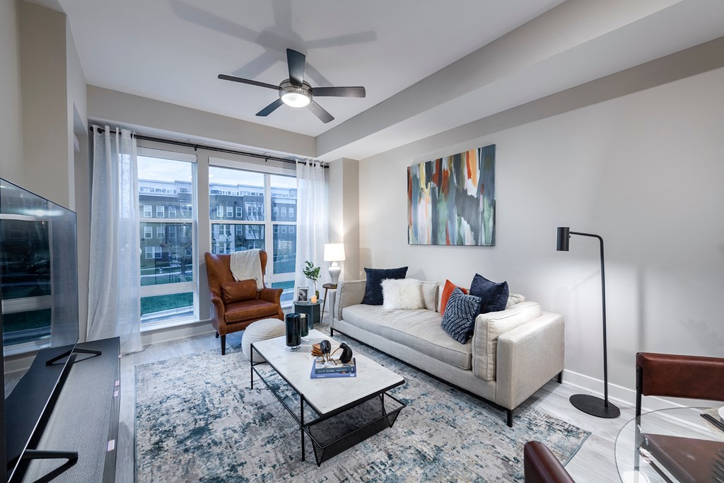 Sleek ash-grey flooring in living areas - Rockwell at Crown