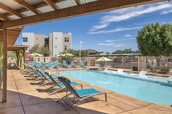 Resort-style swimming pool with sun ledge -  ABQ Uptown Apartments
