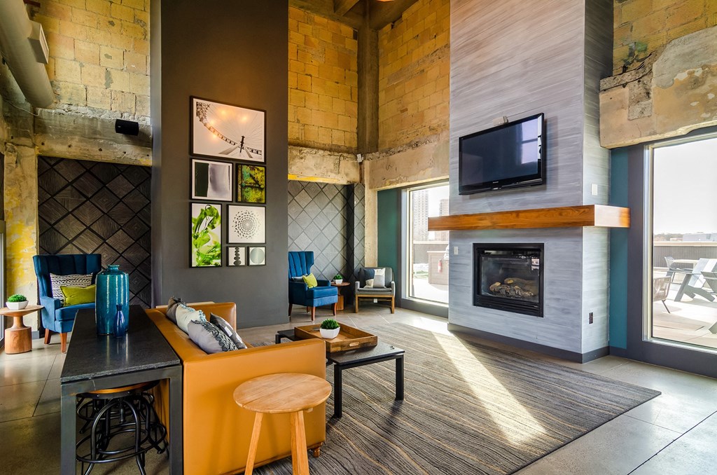 Resident clubhouse great room with fireplace - Eitel Apartments