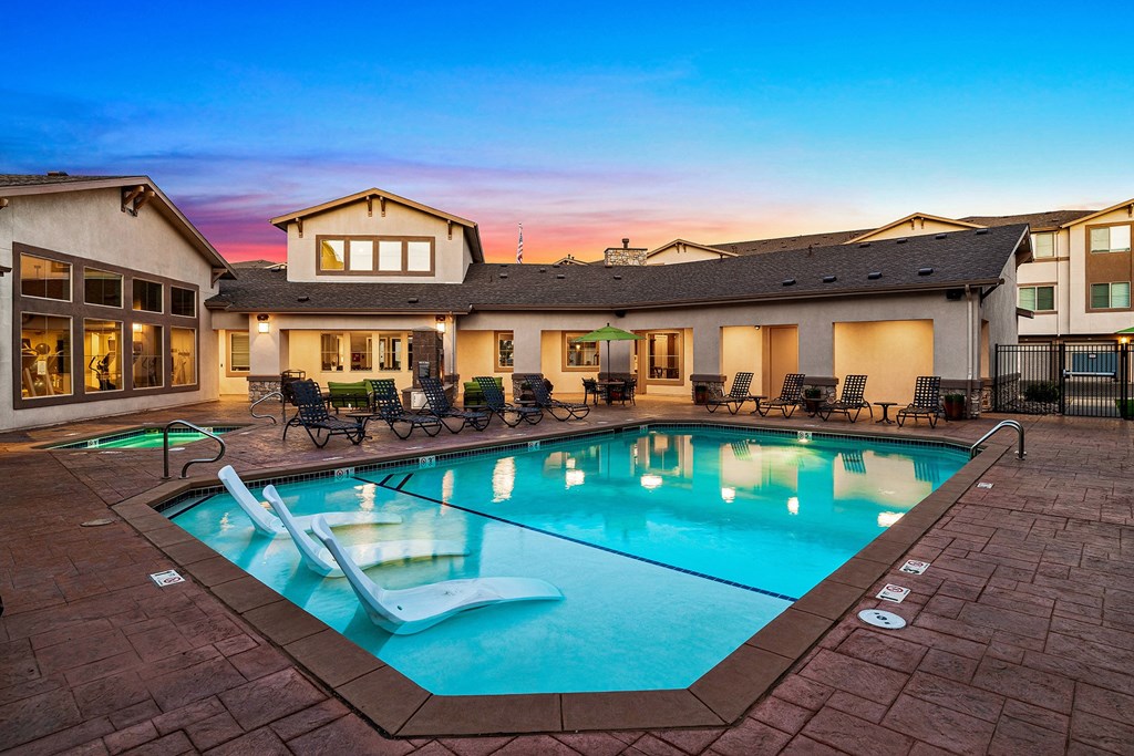 First and Main Apartments resort-style pool with sundeck