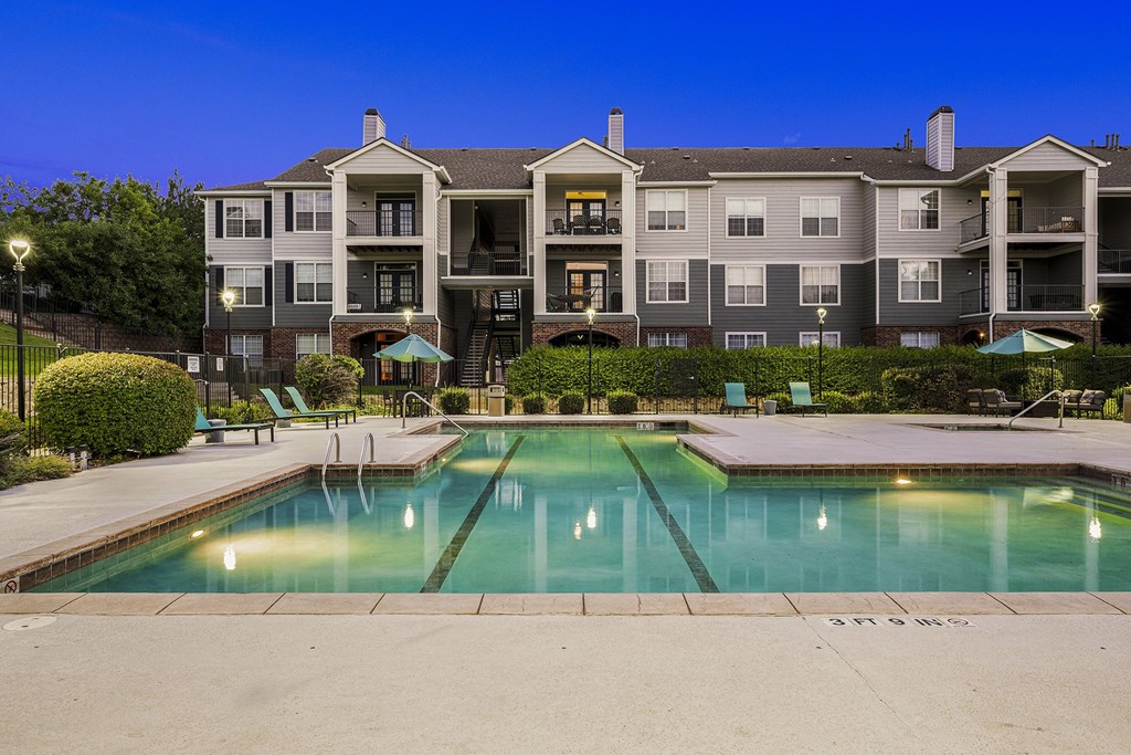 Resort-style swimming pool at dusk - Emmersyn at Lone Tree