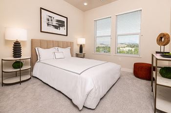 Wood-style flooring with carpeted bedrooms - NOVA at Green Valley