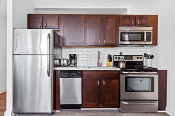 Quartz Countertops in kitchen and bath - The Republic Apartments