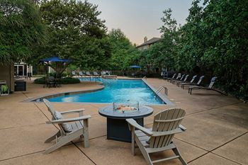 The Estates at River Pointe poolside fire pit