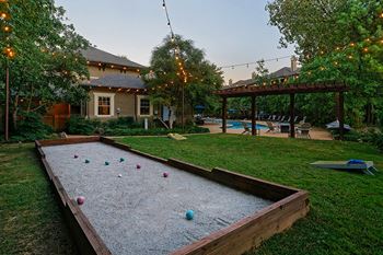 The Estates at River Pointe outdoor recreation area with bocce ball and beanbag toss