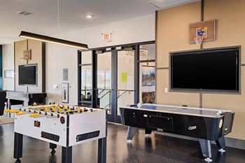 Element 25 foosball table and air hockey with flat screen TVs