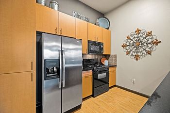 Foothills at Old Town Apartments - Kitchen with upgraded appliances