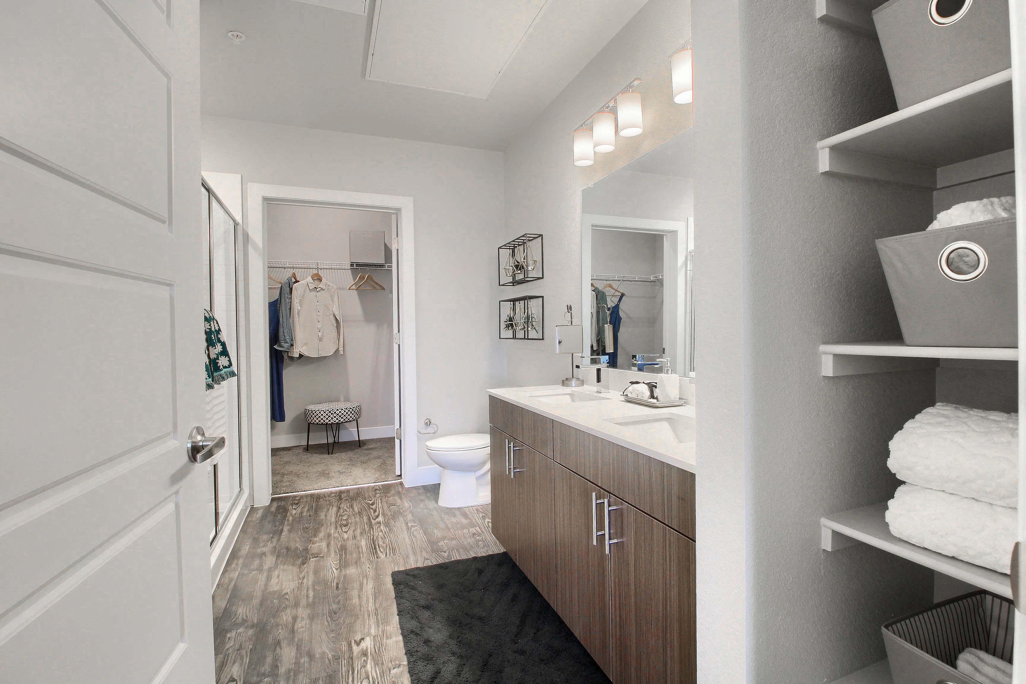 a bathroom with a sink and a toilet and a mirror