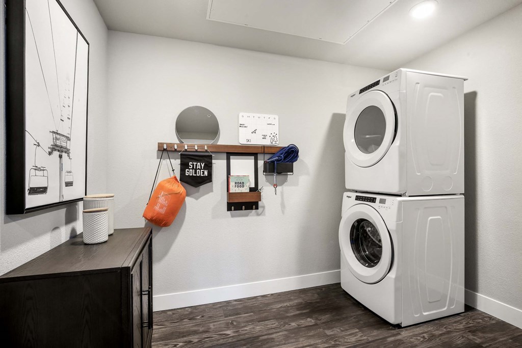 a laundry room with a washing machine and a dryer