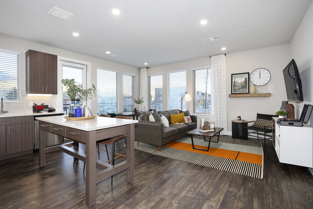 a living room with a couch and a table