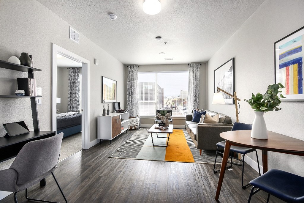 our apartments offer a living room and dining room with a view of the city