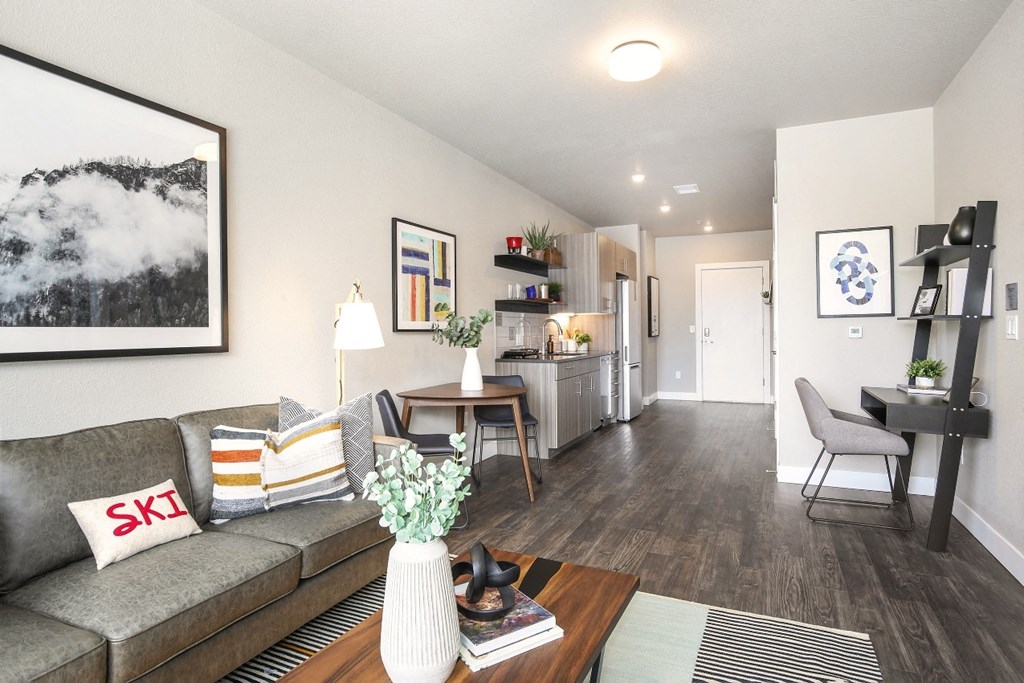 a living room with a couch and a table