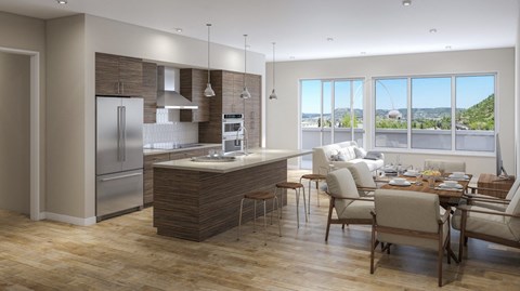 A modern kitchen with a dining table and chairs.