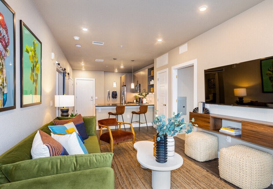 a living room with a couch and a table