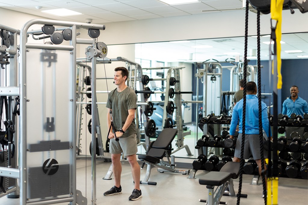 a group of people in the gym at the gym