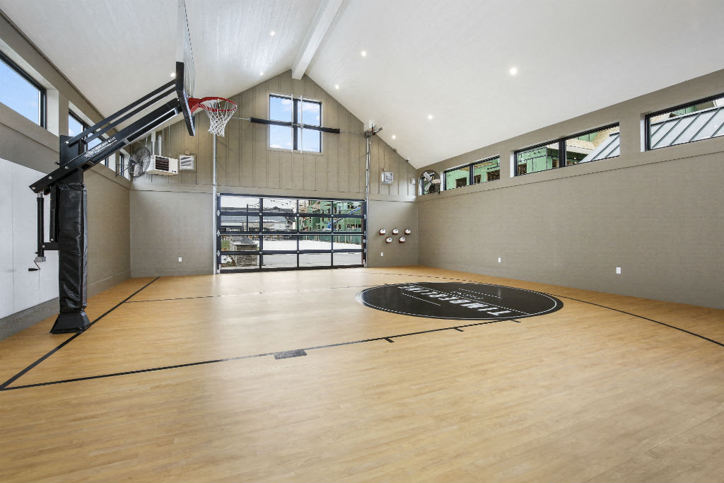 the home has a gym with a basketball court