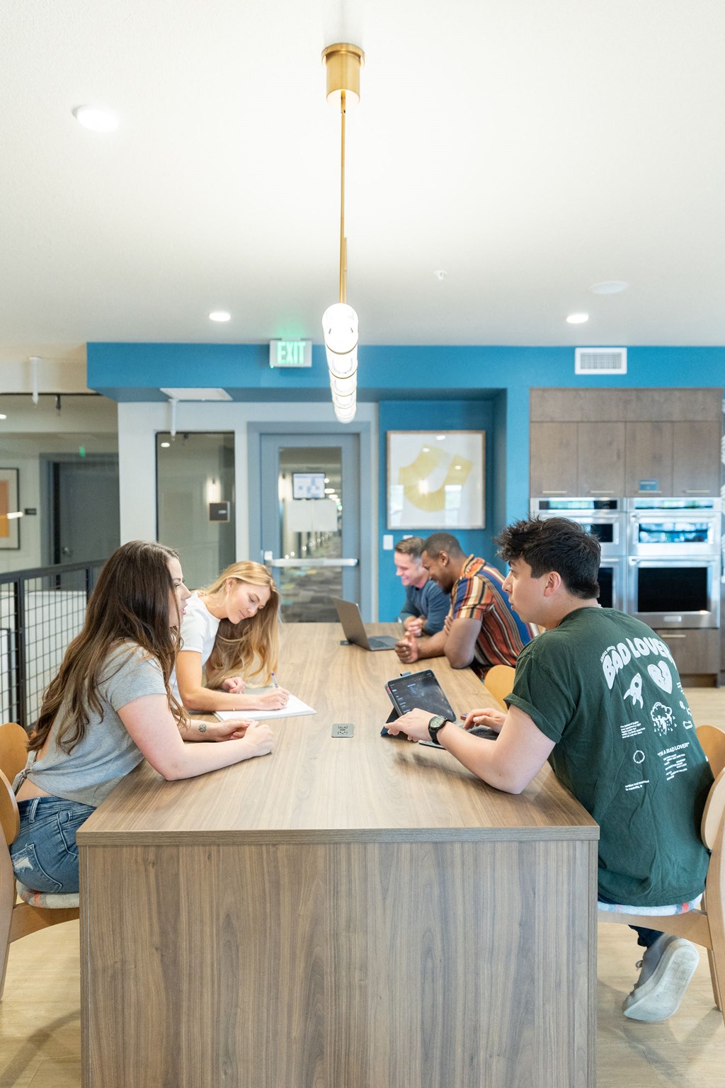 a group of students sitting around a table