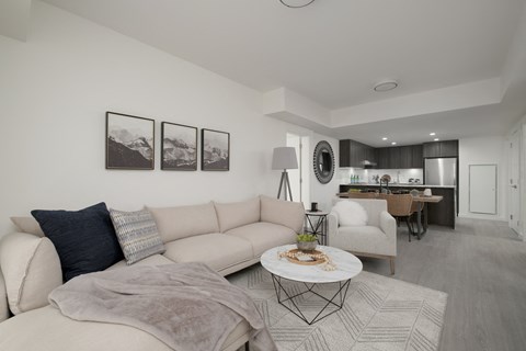 a living room with couches and a coffee table