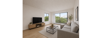 A living room with a grey couch, a wooden cabinet, a flat screen TV and a glass coffee table.