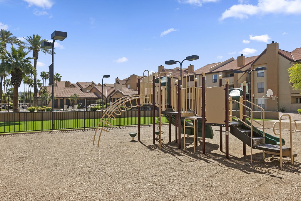 a playground at the whispering winds apartments in pearland, tx