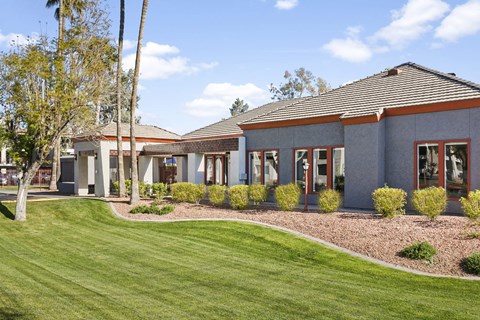 Leasing office building with desert landscaping at Villa de Cortez Apartments, Arizona