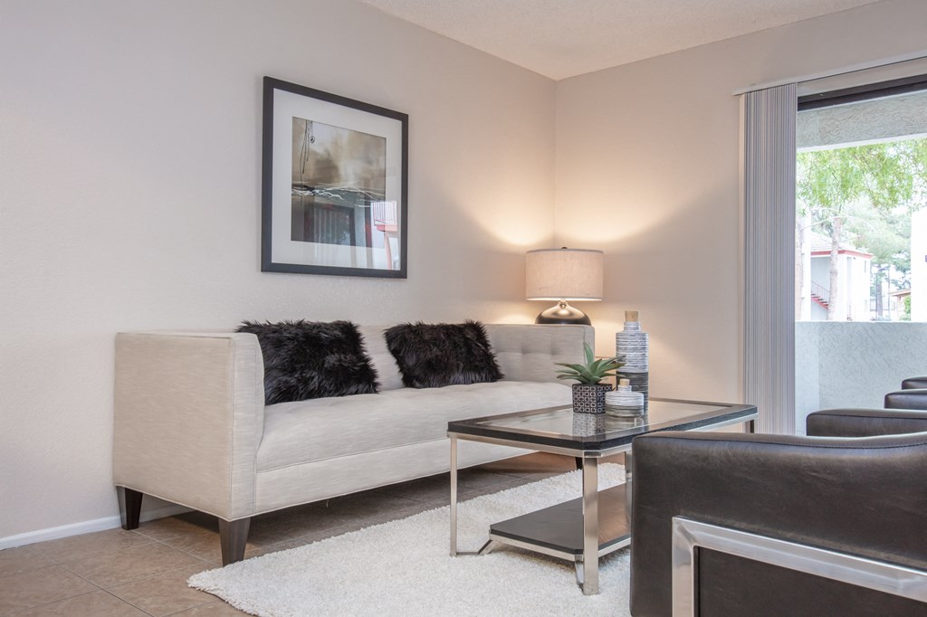 a living room with a couch and a table