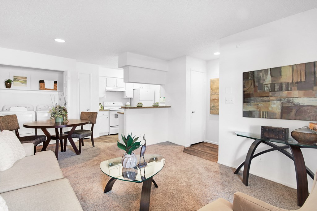 a living room with a couch and a table