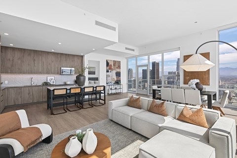 A modern living room with a view of the city.