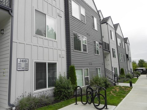 Apartment building with the number 3410 on the front.