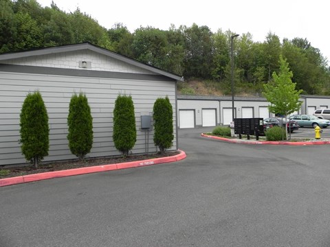 Parking lot in front of a grey building at The Charleston Port Orchard, Washington, 98366