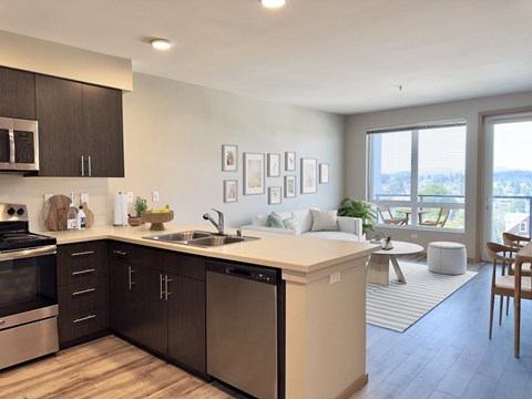 a kitchen and living room in an apartment at Spyglass Hill Apartments, Bremerton, Washington
