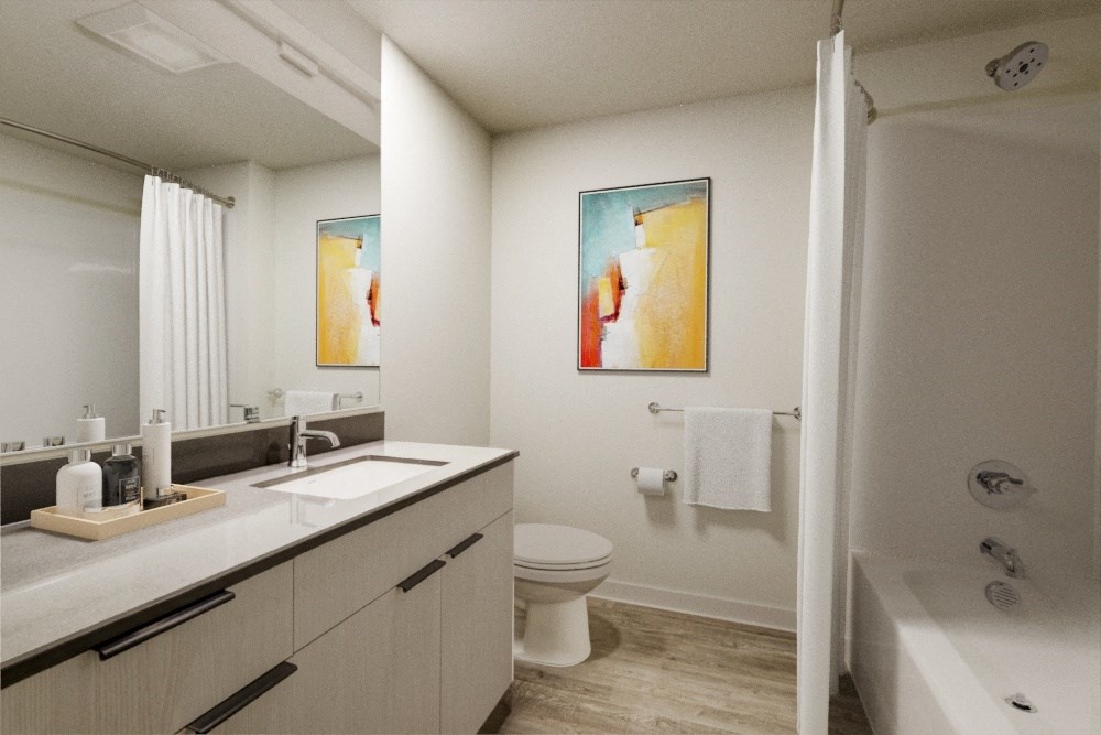 a bathroom with a toilet sink and bathtub