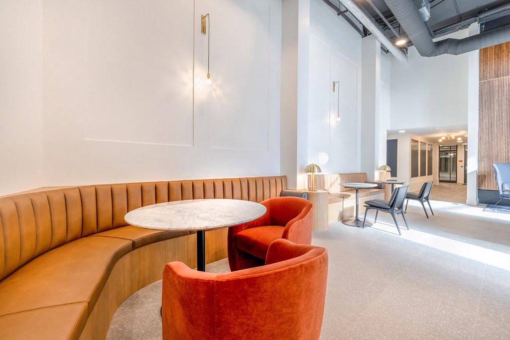 a seating area with a sofa table and chairs at Marina Square, Bremerton