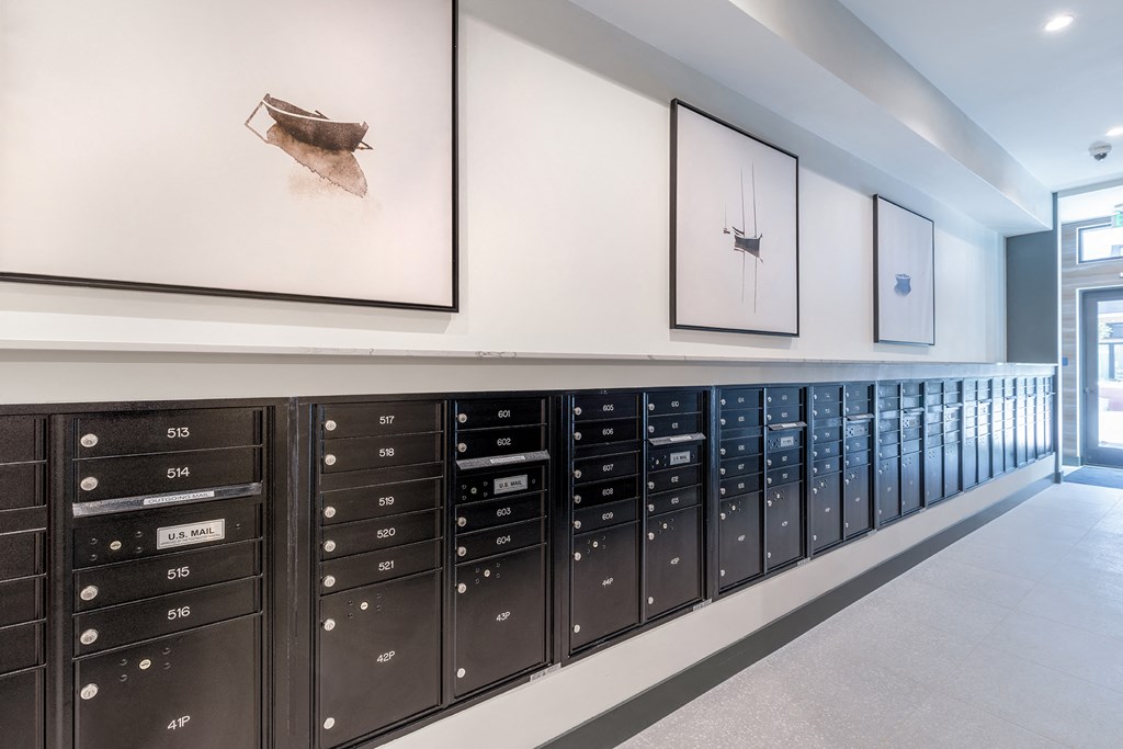 a row of mailbox lockers in a hallway at Marina Square, Washington