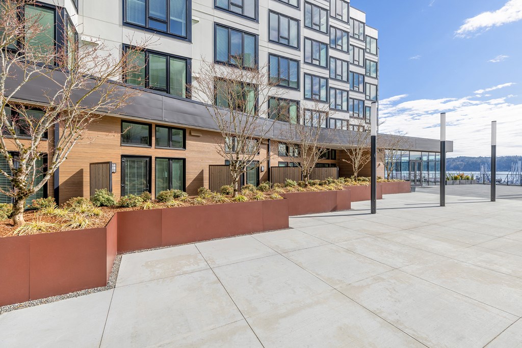 a view of a building with a large terracotta planter in front of it at Marina Square, Bremerton, Washington 98337