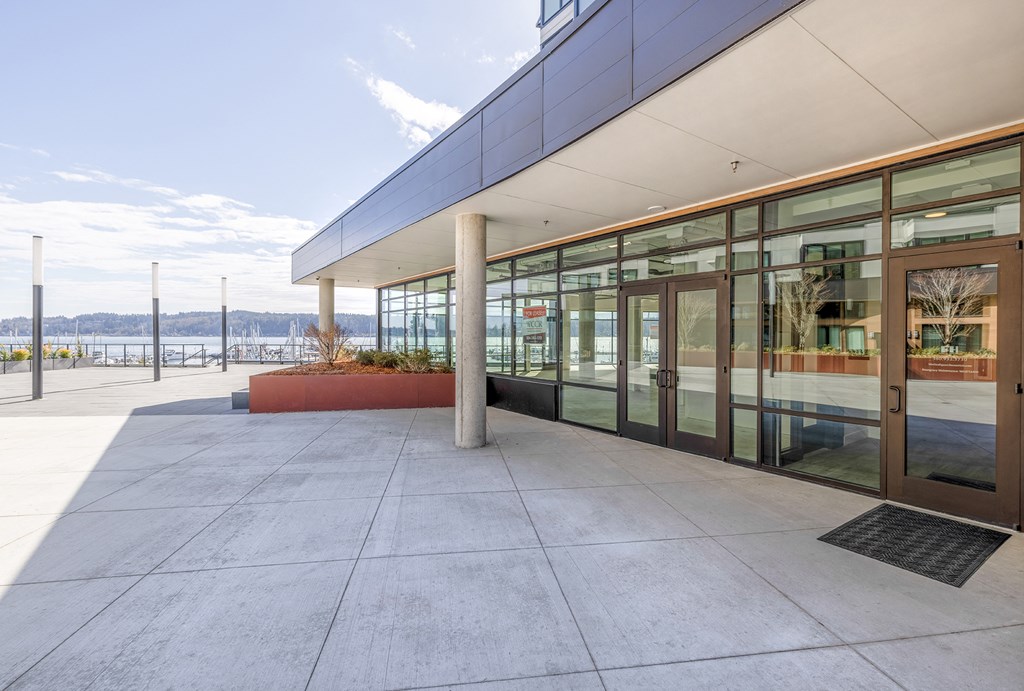 a view of a building with glass windows and doors at Marina Square, Bremerton, 98337