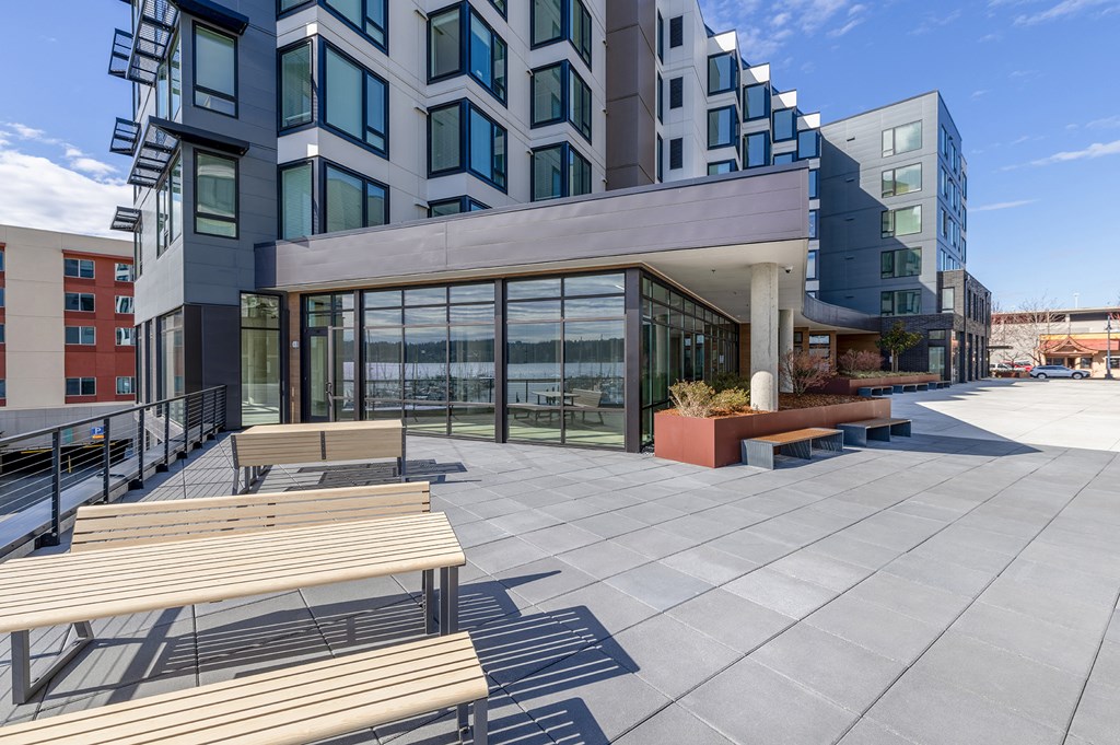 public walking area  with wooden bench seating at Marina Square, Bremerton, 98337