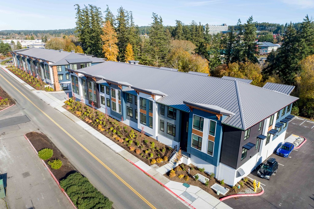 arial view of the roof of a building with trees at Rivulet, Silverdale, WA