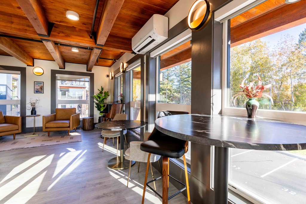 a kitchen with a counter and a large window at Rivulet, Silverdale, WA