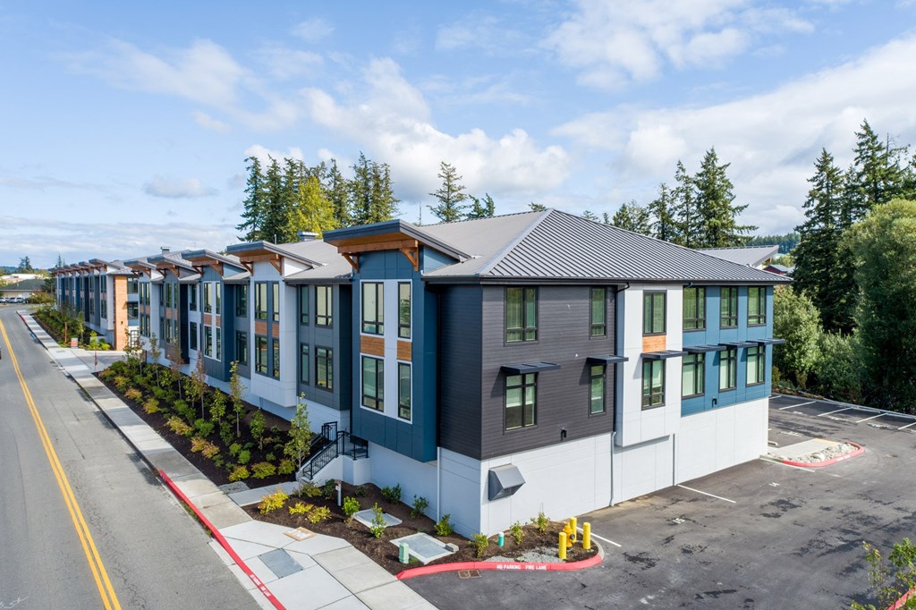 an aerial view of a row of houses in a parking lot at Rivulet, Silverdale