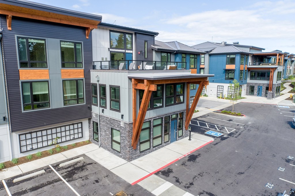 new homes in a row on a city street at Rivulet, Silverdale, 98383