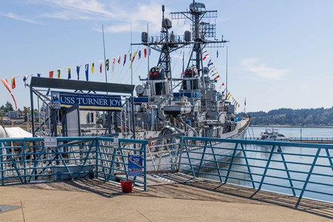 A large ship named USS Turner Joy is docked at a pier at Spyglass Hill Apartments, Bremerton, 98337